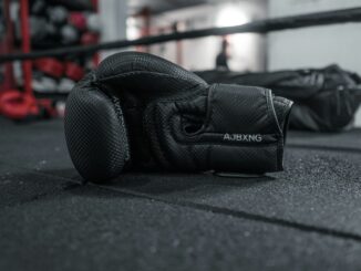 Boxing gloves illustrating the launch of the DeepSeek-R1 reasoning model by DeepSeek that challenges OpenAI in a range of AI performance benchmarks.